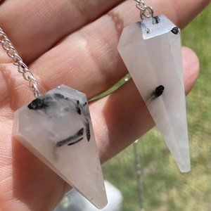 Tourmaline in quartz pendulums